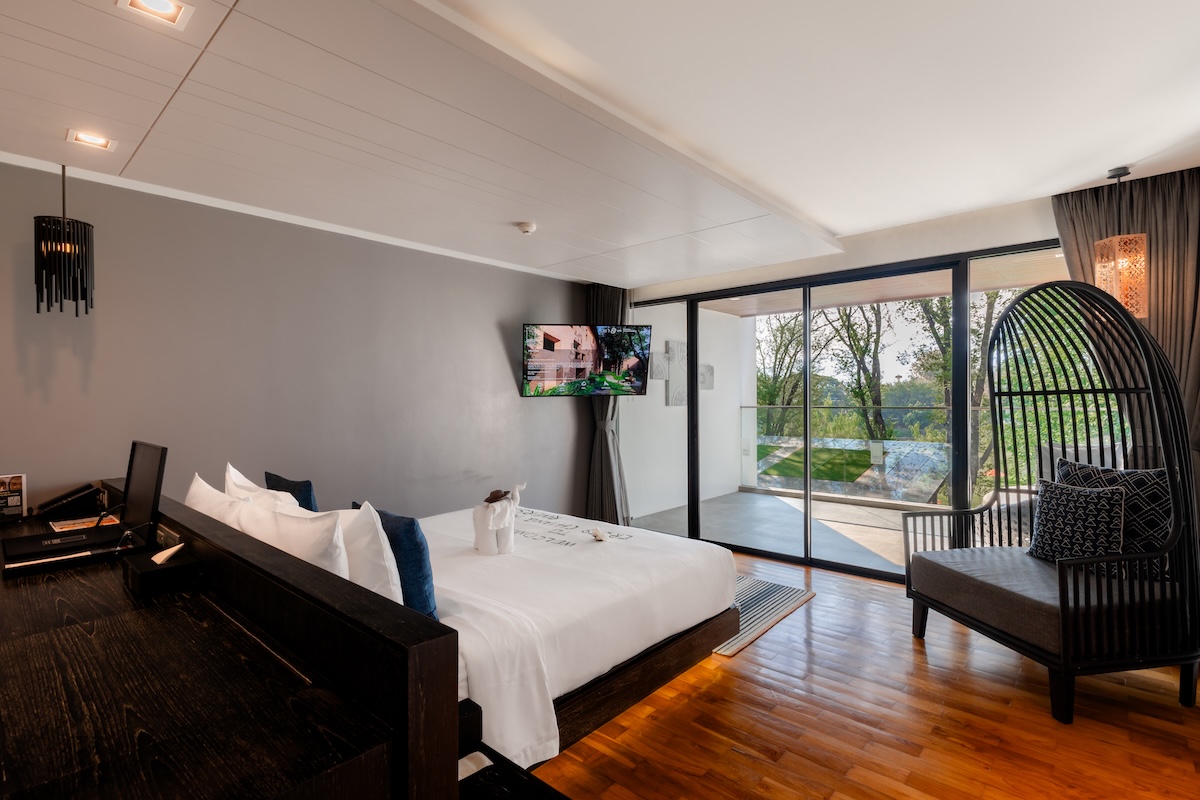 ครอส เชียงใหม่ ริเวอร์ไซด์ Cross Chiang Mai Riverside — ห้องนอนสวีท